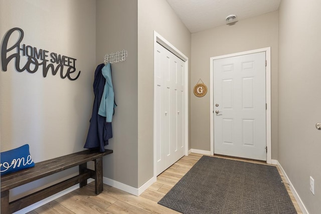 307 Brussels Ct, Marshall, MN 56258 - entryway featuring light wood-type flooring and baseboards