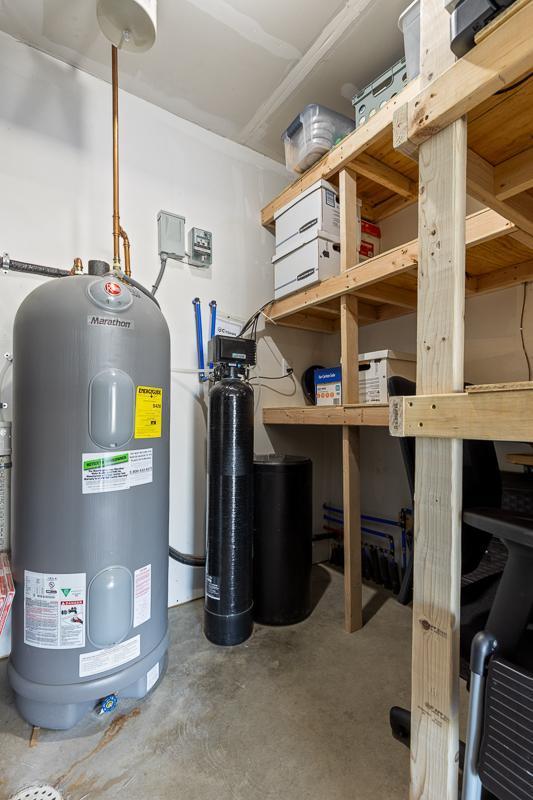 307 Brussels Ct, Marshall, MN 56258 - utility room with water heater