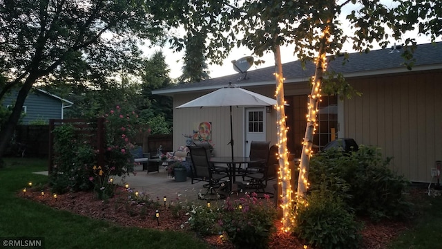 1904 Parkview Rd NE, Alexandria, MN 56308 - back of house with a patio area, a fire pit, and a shingled roof