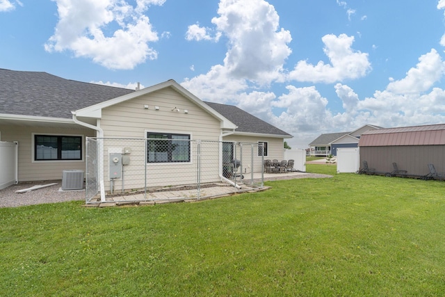 101 Butterfly Ct, Blue Earth, MN 56013 - back of property with a patio area and a shingled roof