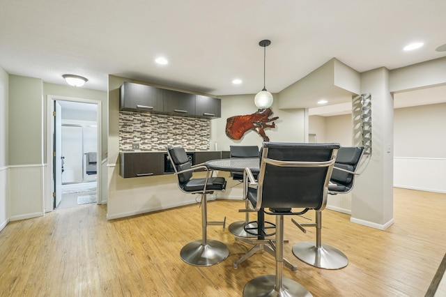 5705 Covington Cir, Minnetonka, MN 55345 - dining room with light wood-style flooring and recessed lighting