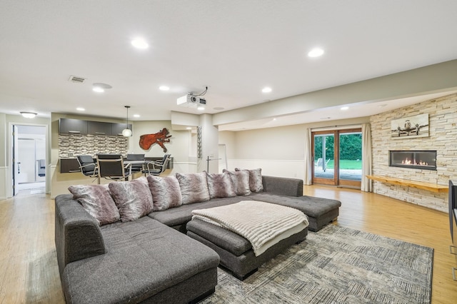 5705 Covington Cir, Minnetonka, MN 55345 - living area featuring light wood-type flooring, recessed lighting, and a fireplace