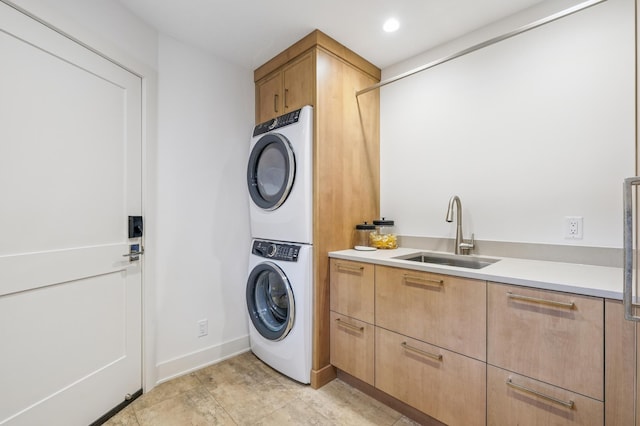 5705 Covington Cir, Minnetonka, MN 55345 - laundry area with stacked washing machine and dryer, cabinet space, and recessed lighting