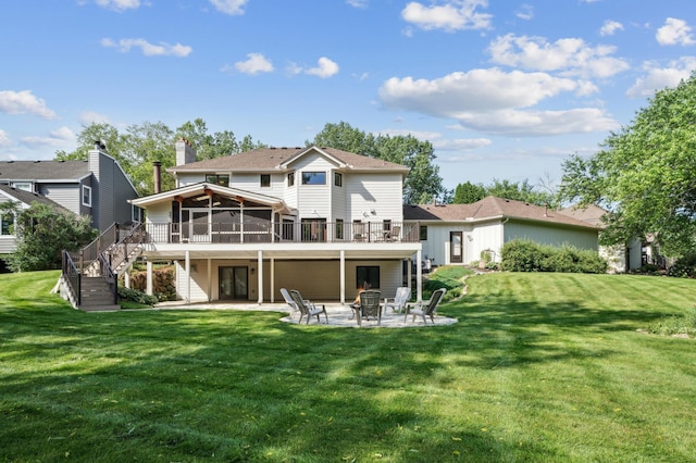 5705 Covington Cir, Minnetonka, MN 55345 - rear view of house with stairway, a fire pit, a patio, a sunroom, and a wooden deck