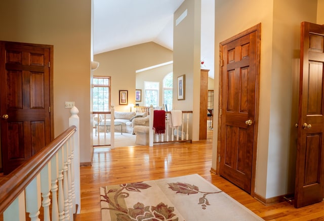 8980 160th Ln NW, Ramsey, MN 55303 - foyer entrance with light wood-style flooring and high vaulted ceiling