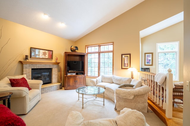 8980 160th Ln NW, Ramsey, MN 55303 - living area featuring a brick fireplace and high vaulted ceiling