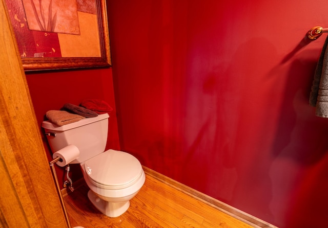 8980 160th Ln NW, Ramsey, MN 55303 - bathroom featuring toilet and wood finished floors