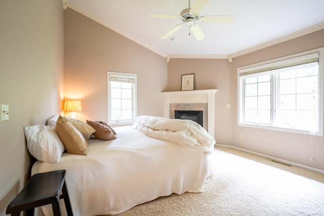 8980 160th Ln NW, Ramsey, MN 55303 - bedroom with ornamental molding, carpet, vaulted ceiling, multiple windows, and a fireplace