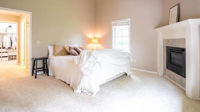 8980 160th Ln NW, Ramsey, MN 55303 - bedroom with carpet and a glass covered fireplace