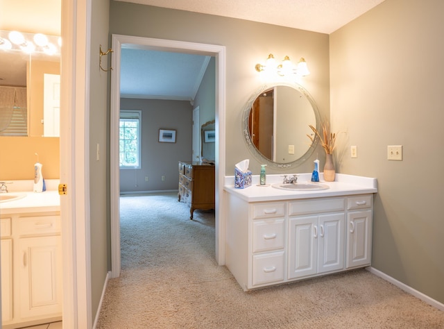 8980 160th Ln NW, Ramsey, MN 55303 - bathroom featuring vanity, carpet floors, and crown molding