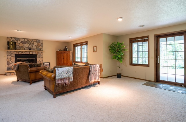 8980 160th Ln NW, Ramsey, MN 55303 - carpeted living room with baseboards and a fireplace