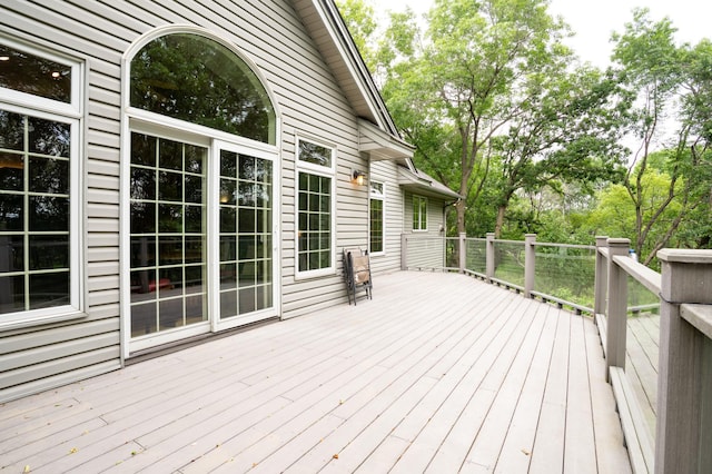8980 160th Ln NW, Ramsey, MN 55303 - wooden deck with view of scattered trees