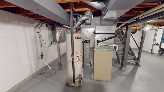507 Hawthorne St, Albert Lea, MN 56007 - unfinished below grade area featuring gas water heater and stairs