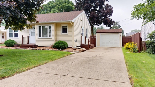 507 Hawthorne St, Albert Lea, MN 56007 - view of front of property featuring an outdoor structure, concrete driveway, and a garage