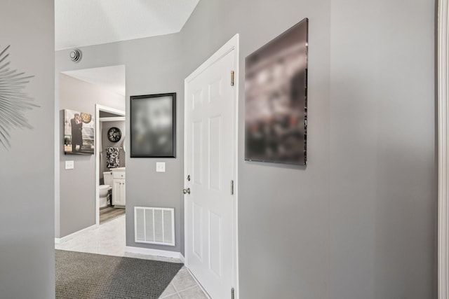 1021 18th Ave SE, Forest Lake, MN 55025 - hall featuring light tile patterned floors and baseboards