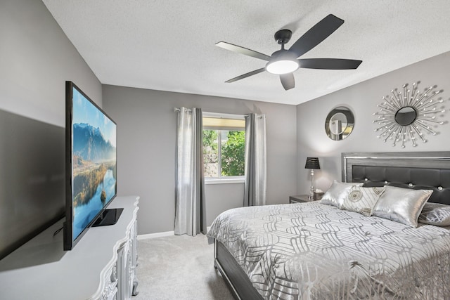 1021 18th Ave SE, Forest Lake, MN 55025 - carpeted bedroom featuring a textured ceiling and ceiling fan