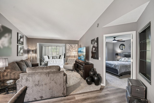 1021 18th Ave SE, Forest Lake, MN 55025 - living area featuring wood finished floors, a ceiling fan, and vaulted ceiling