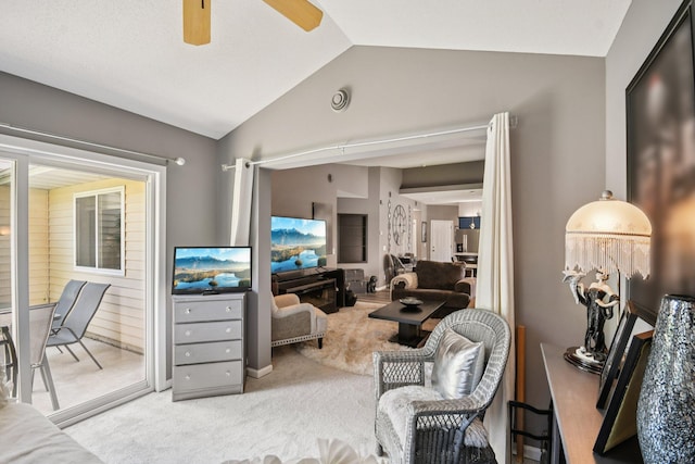1021 18th Ave SE, Forest Lake, MN 55025 - living area with lofted ceiling, carpet floors, and a ceiling fan