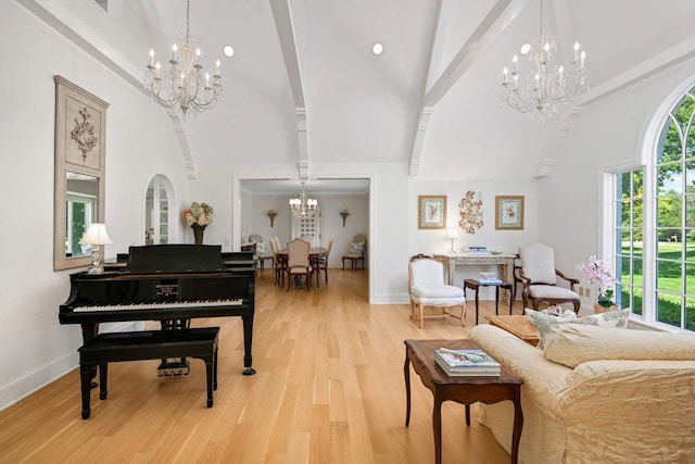 2255 French Creek Cir, Orono, MN 55391 - living room featuring a chandelier, high vaulted ceiling, light wood-type flooring, and beam ceiling