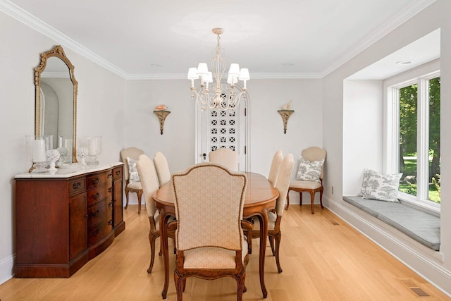 2255 French Creek Cir, Orono, MN 55391 - dining space with light wood-type flooring, a chandelier, and ornamental molding