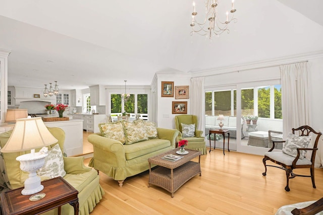 2255 French Creek Cir, Orono, MN 55391 - living room featuring a chandelier, plenty of natural light, and light wood-type flooring