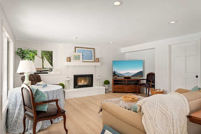 2255 French Creek Cir, Orono, MN 55391 - living area featuring a fireplace, wood finished floors, and recessed lighting