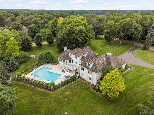 2255 French Creek Cir, Orono, MN 55391 - aerial view of property and surrounding area featuring a pool area and a forest