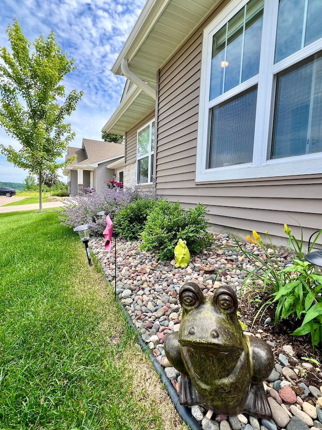 1180 Hewitt Blvd, Red Wing, MN 55066 - view of property exterior featuring a yard