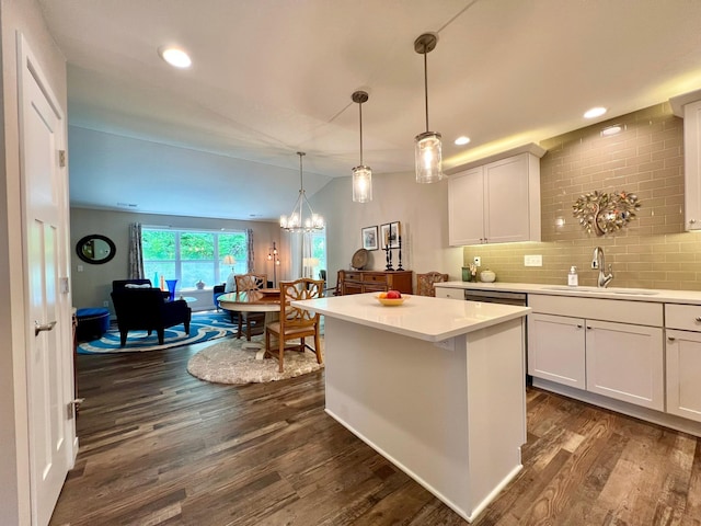 1180 Hewitt Blvd, Red Wing, MN 55066 - kitchen featuring dark wood finished floors, light countertops, recessed lighting, and pendant lighting