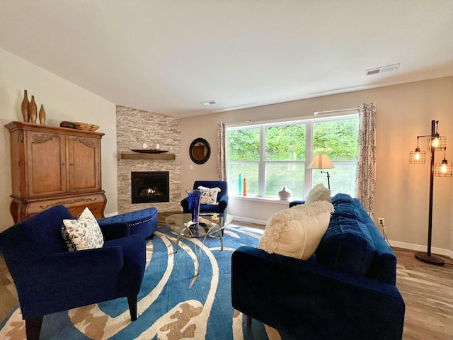1180 Hewitt Blvd, Red Wing, MN 55066 - living area featuring wood finished floors and a fireplace