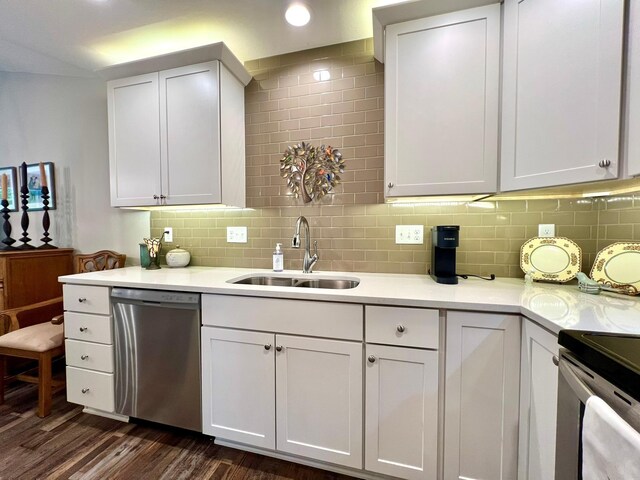 1180 Hewitt Blvd, Red Wing, MN 55066 - kitchen featuring stainless steel dishwasher, dark wood-style floors, light countertops, tasteful backsplash, and recessed lighting