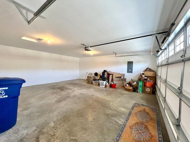 1180 Hewitt Blvd, Red Wing, MN 55066 - garage featuring a garage door opener and electric panel