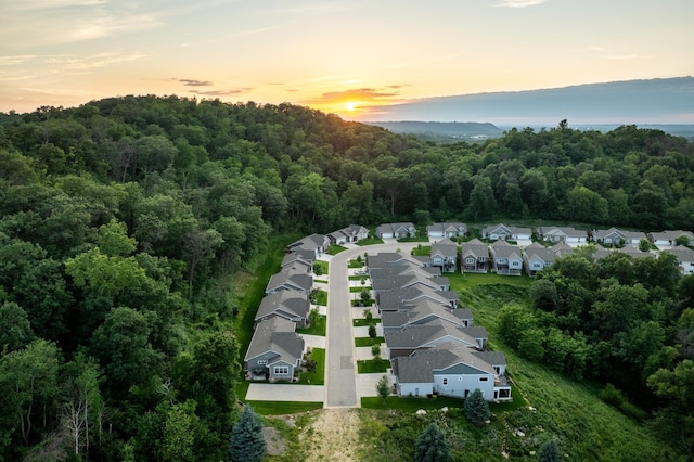 1180 Hewitt Blvd, Red Wing, MN 55066 - aerial view at dusk of a residential view and a view of trees