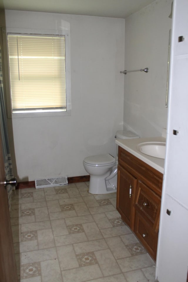 25394 370th St, Browerville, MN 56438 - bathroom with vanity and toilet