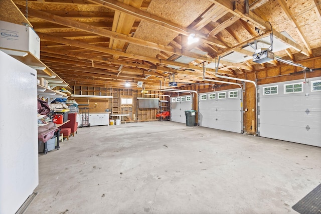 70190 218th St, Dassel, MN 55325 - garage featuring a garage door opener