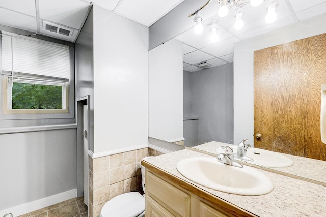 4775 126th Street Ct N, Hugo, MN 55110 - bathroom with vanity and a drop ceiling