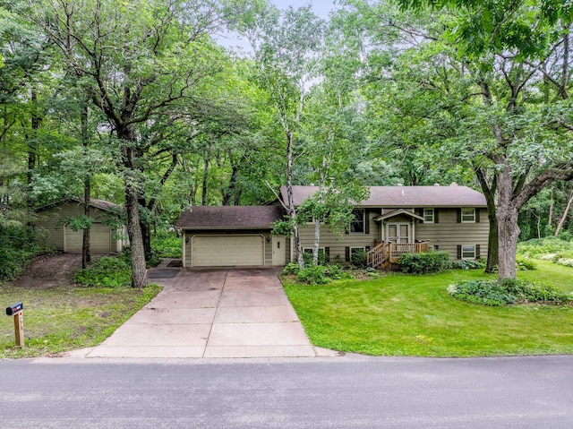 4775 126th Street Ct N, Hugo, MN 55110 - bi-level home with driveway, an attached garage, and a front yard