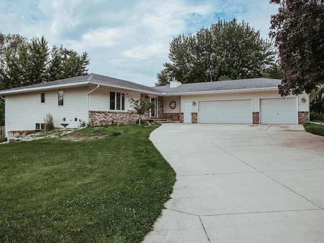 610 25th St SW, Austin, MN 55912 - ranch-style home featuring an attached garage, driveway, and a front yard
