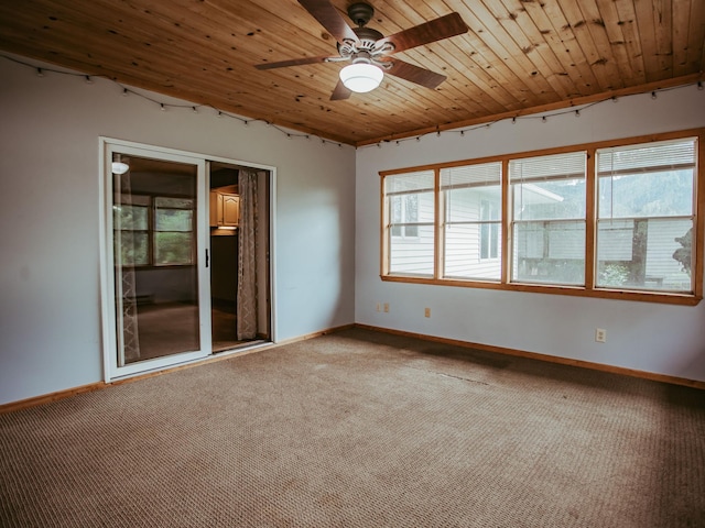 610 25th St SW, Austin, MN 55912 - empty room with carpet, a ceiling fan, and wooden ceiling