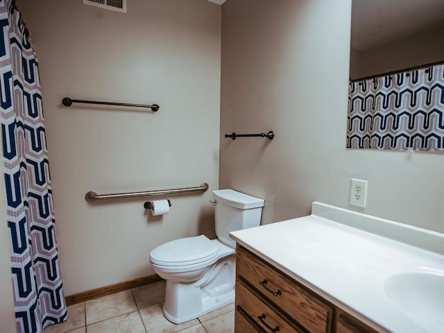 610 25th St SW, Austin, MN 55912 - bathroom featuring vanity, tile patterned flooring, and curtained shower