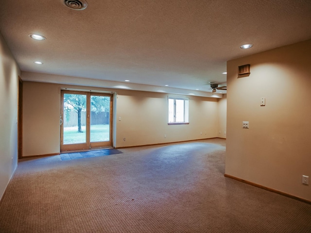 610 25th St SW, Austin, MN 55912 - unfurnished room with carpet, ceiling fan, recessed lighting, and a textured ceiling