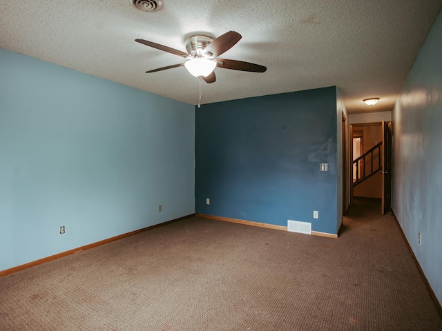 610 25th St SW, Austin, MN 55912 - unfurnished room with carpet floors, ceiling fan, and a textured ceiling