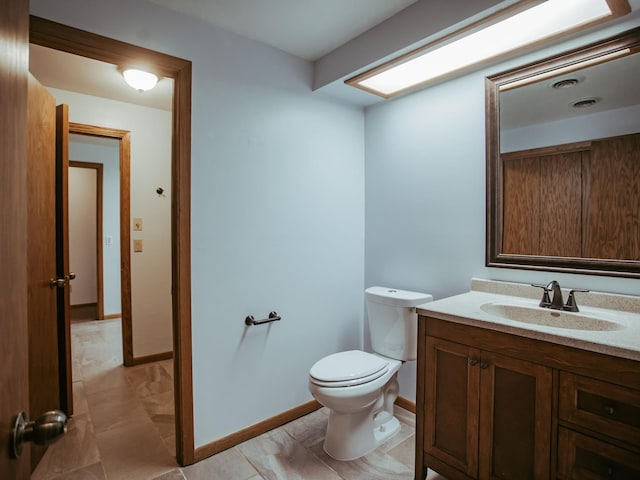 610 25th St SW, Austin, MN 55912 - half bathroom with vanity and toilet