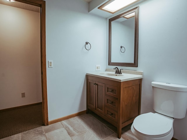 610 25th St SW, Austin, MN 55912 - bathroom featuring vanity and toilet