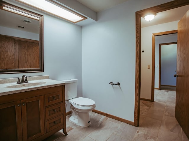 610 25th St SW, Austin, MN 55912 - half bath featuring vanity and toilet