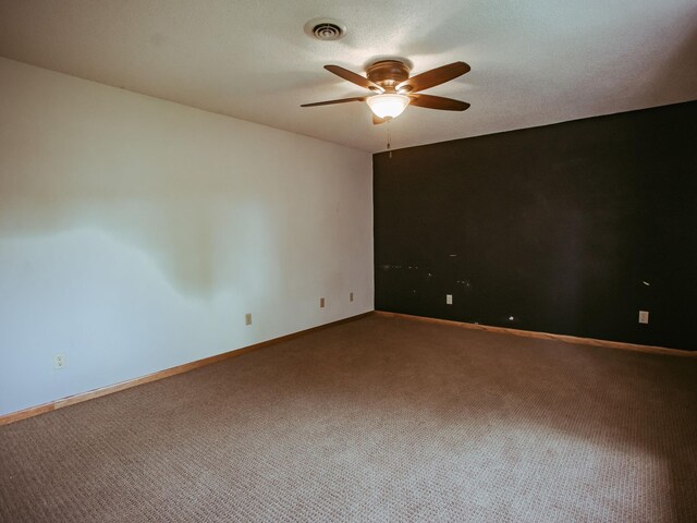 610 25th St SW, Austin, MN 55912 - unfurnished room with ceiling fan and carpet