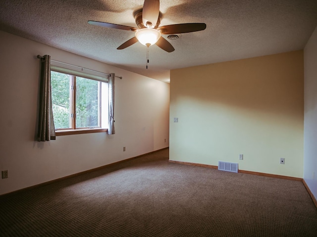 610 25th St SW, Austin, MN 55912 - carpeted empty room with a ceiling fan and a textured ceiling