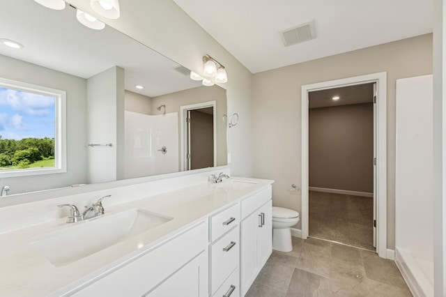 2627 Arbor Dr, Buffalo, MN 55313 - full bathroom featuring double vanity, a shower, and recessed lighting