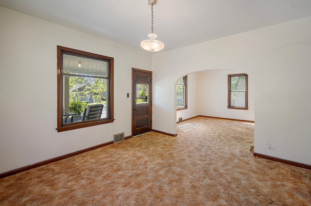 431 19 1/2 Ave N, Saint Cloud, MN 56303 - carpeted spare room featuring arched walkways and baseboards