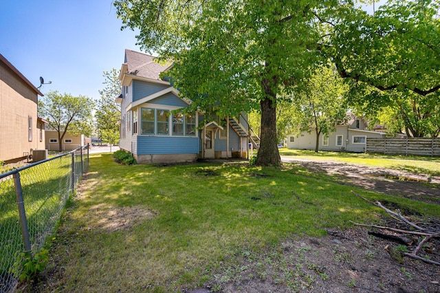 431 19 1/2 Ave N, Saint Cloud, MN 56303 - view of front of property featuring a sunroom and a shingled roof